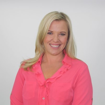 Val Leeming, financial and wellbeing expert, smiling.